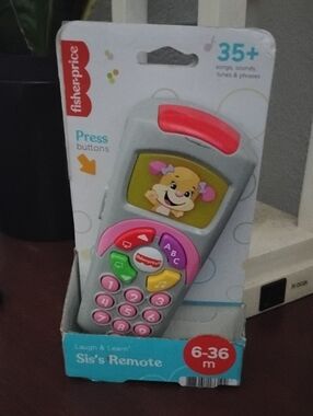 Fisher-Price Pink and Gray Laugh & Learn Sis's Remote Toy